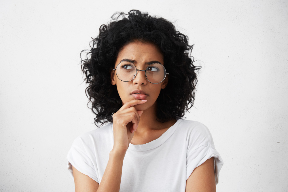 Contemplative Woman With Curly Hair