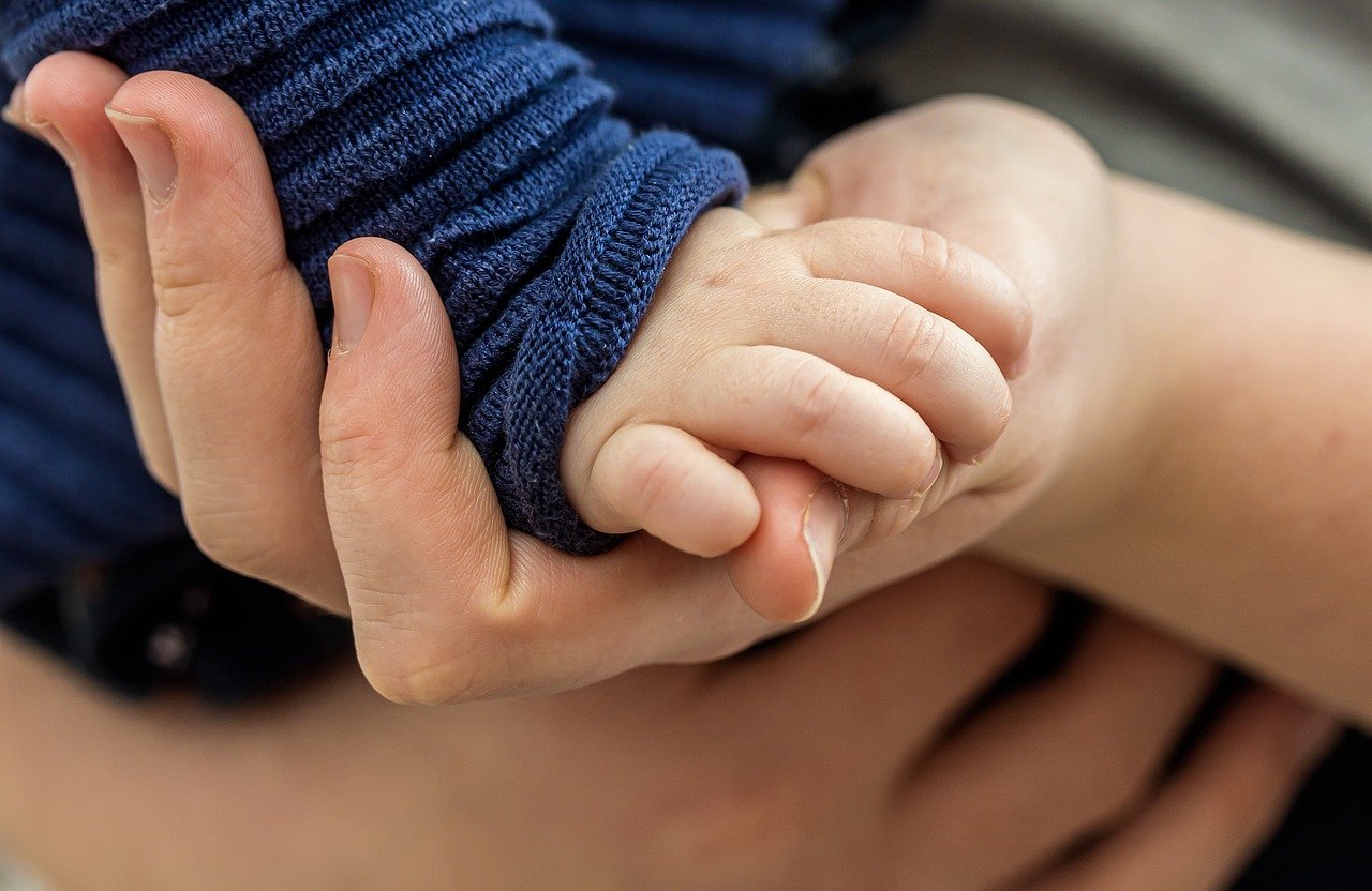 Gentle Grip Of A Child's Hand